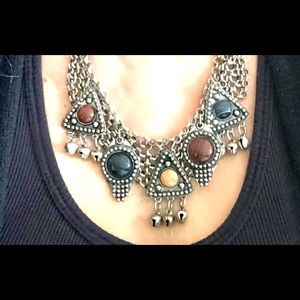 Ornate Silver-Tone Pendant With Stones.